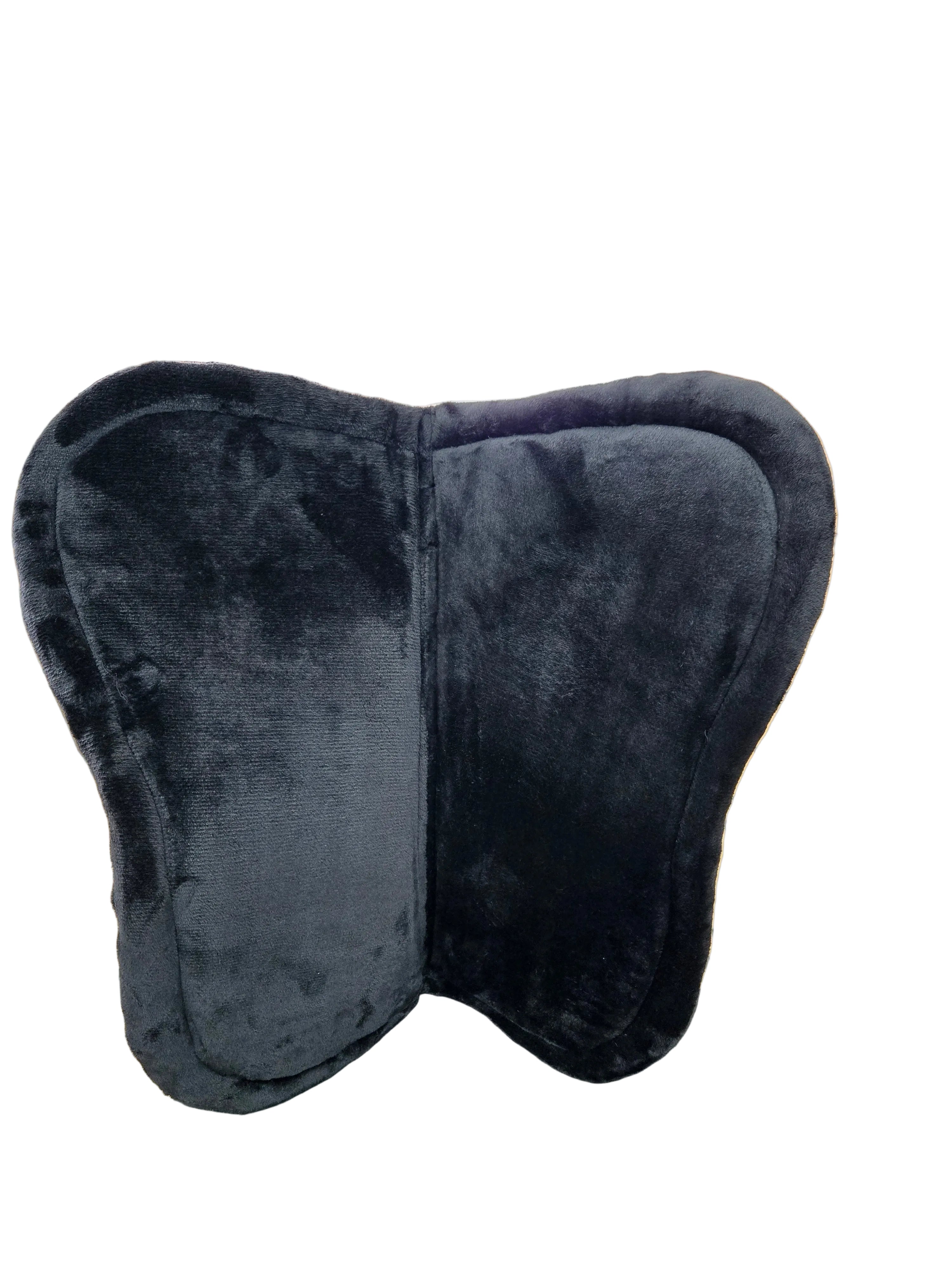 Black saddle pad on a tiled floor with a store interior in the background
